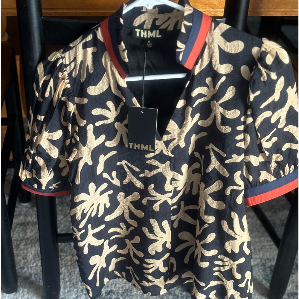 Brand new with tag. THML top size XS